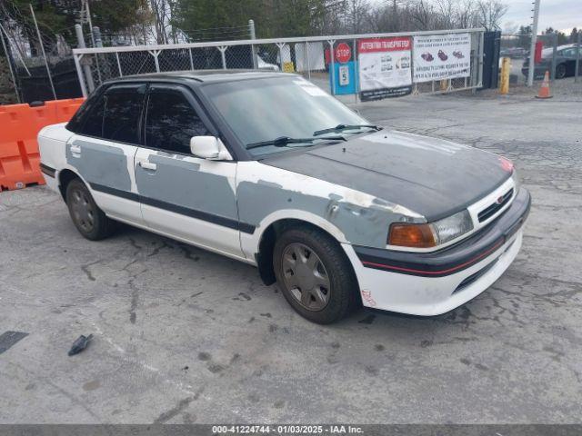  Salvage Mazda Protege